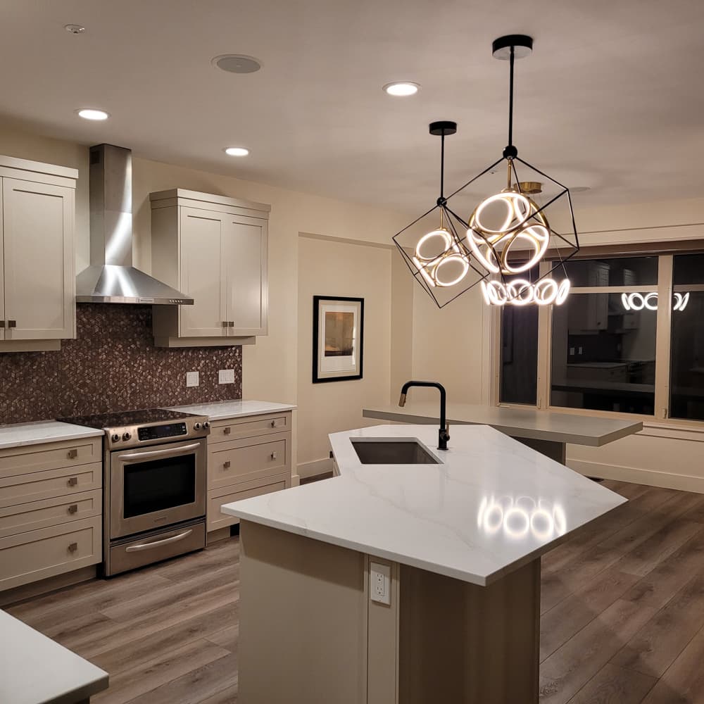 Modern white kitchen renovation by Morad Remodeling